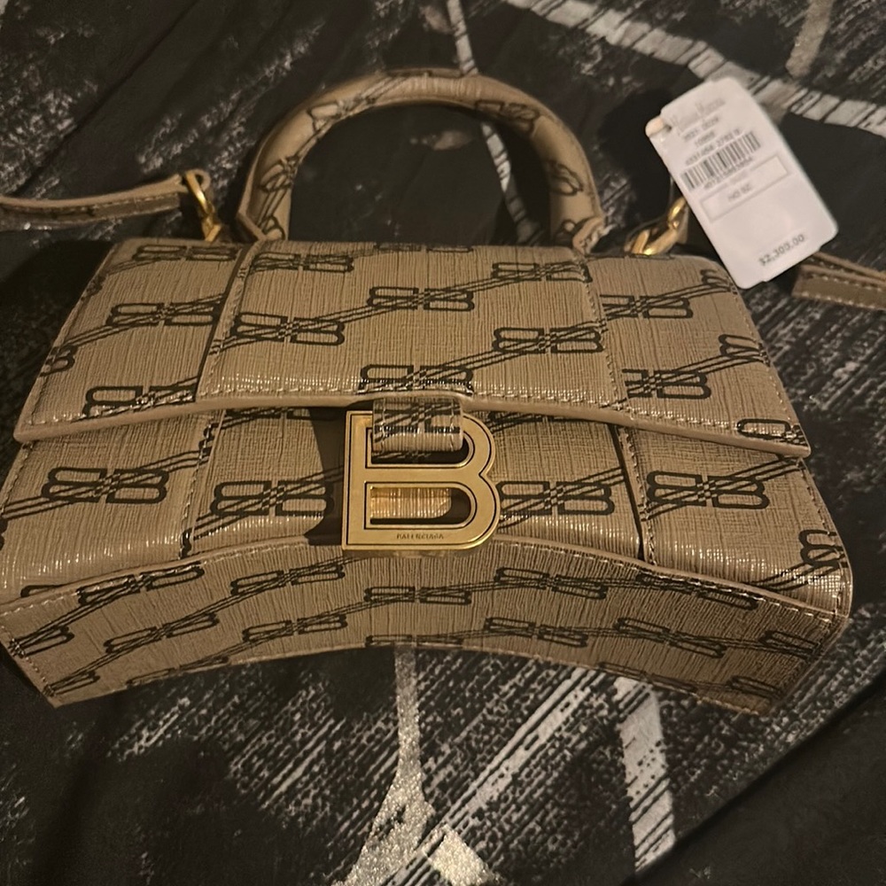 Small brown with black writing all over